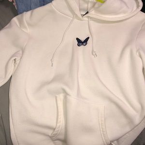 hoodie w an embroidered butterfly